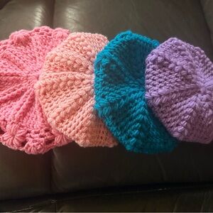Baby’s handmade knitted hats